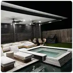 Pool with sitting area  designed and installed by Ecoworks