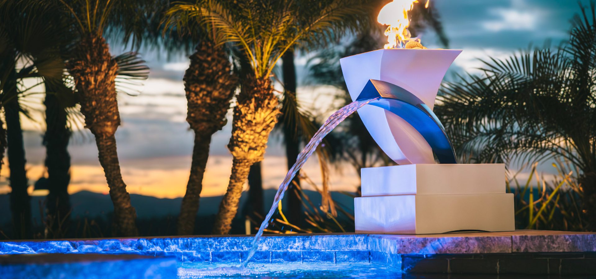 Why Everyone’s Adding Fire Features to Their Pool Areas